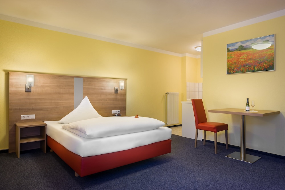 Apartamento Business, 1 cama individual del hotel Acora Karlsruhe Zentrum Living The City. Foto 1