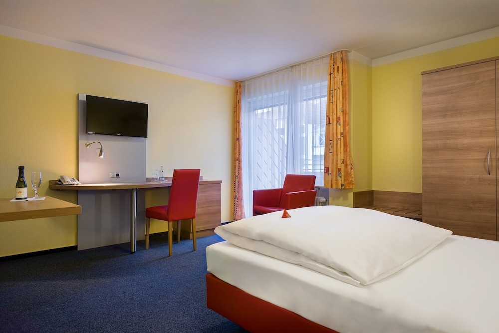 Apartamento Business, 1 cama individual del hotel Acora Karlsruhe Zentrum Living The City. Foto 2