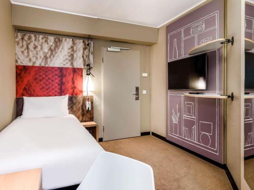 Habitación Individual del hotel Ibis Muenchen City. Foto 1