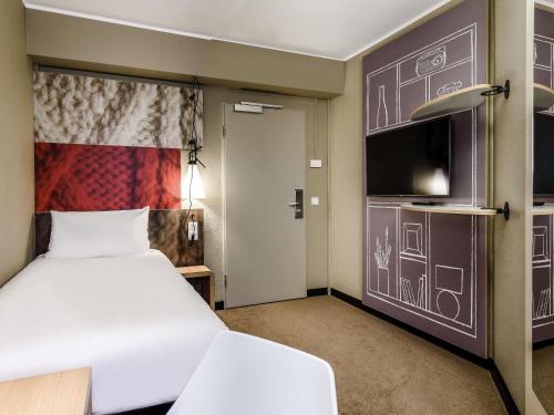 Habitación Individual del hotel Ibis Muenchen City. Foto 6