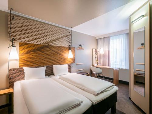 Habitación Doble - 2 camas del hotel Ibis Muenchen City. Foto 3