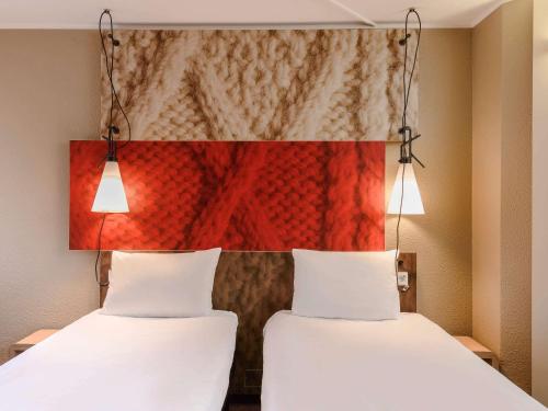Habitación Doble - 2 camas del hotel Ibis Muenchen City. Foto 8