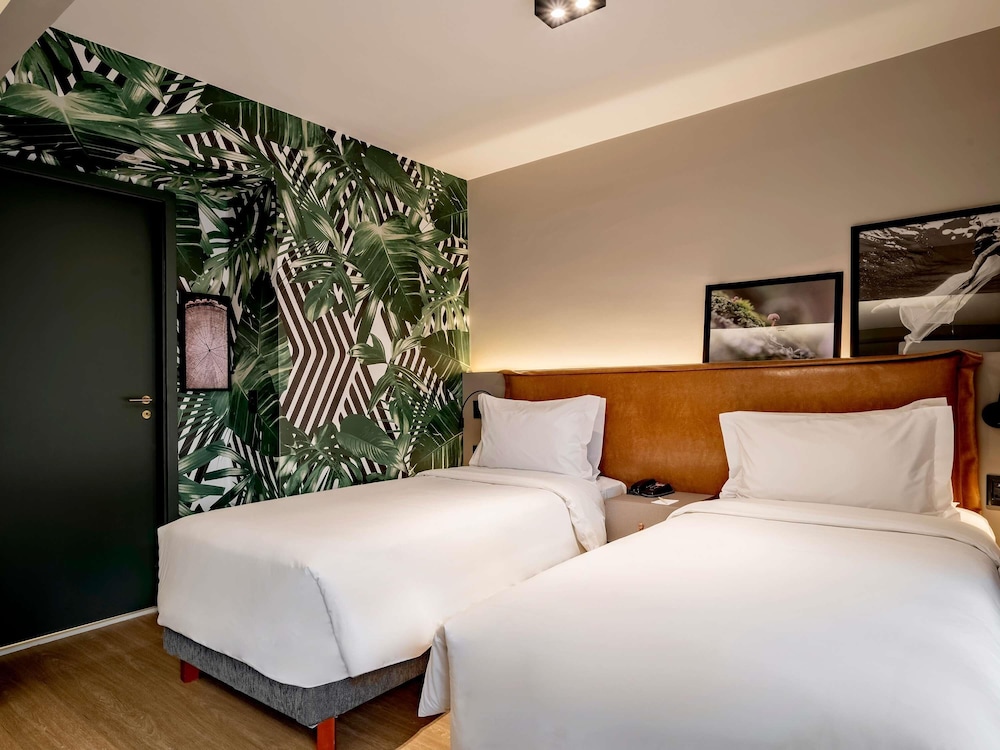 Habitación Deluxe con Dos Camas Individuales y Balcón del hotel Grand Mercure SP Itaim Bibi. Foto 8