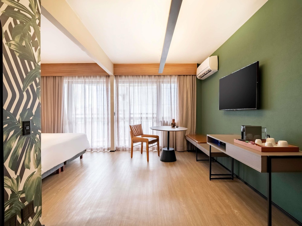 Habitación Executive con 1 cama king size y balcón (vistas al parque) del hotel Grand Mercure SP Itaim Bibi. Foto 4