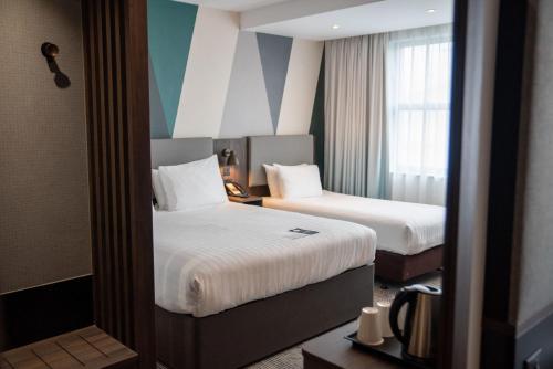 Habitación Estándar con cama doble e individual del hotel Holiday Inn London - Whitechapel