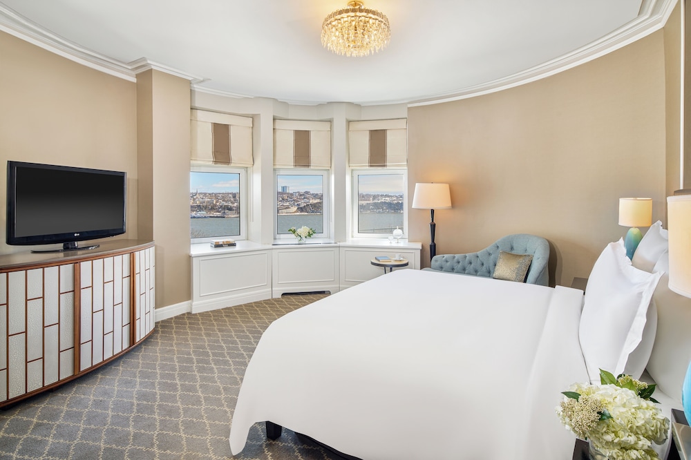 Habitación Signature, 1 cama de matrimonio grande del hotel Fairmont Le Chateau Frontenac. Foto 1