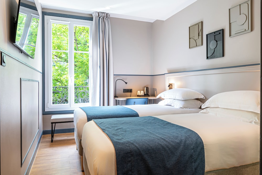 Habitación clásica con 2 camas individuales del hotel Best Western Montcalm. Foto 1