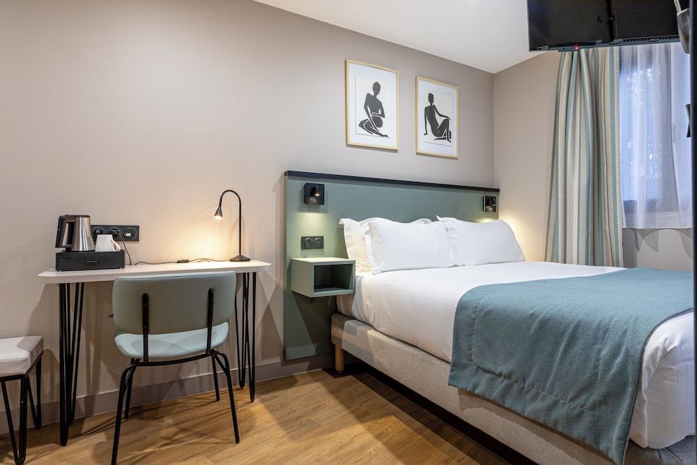 Habitación clásica doble, en la zona del jardín del hotel Best Western Montcalm. Foto 6