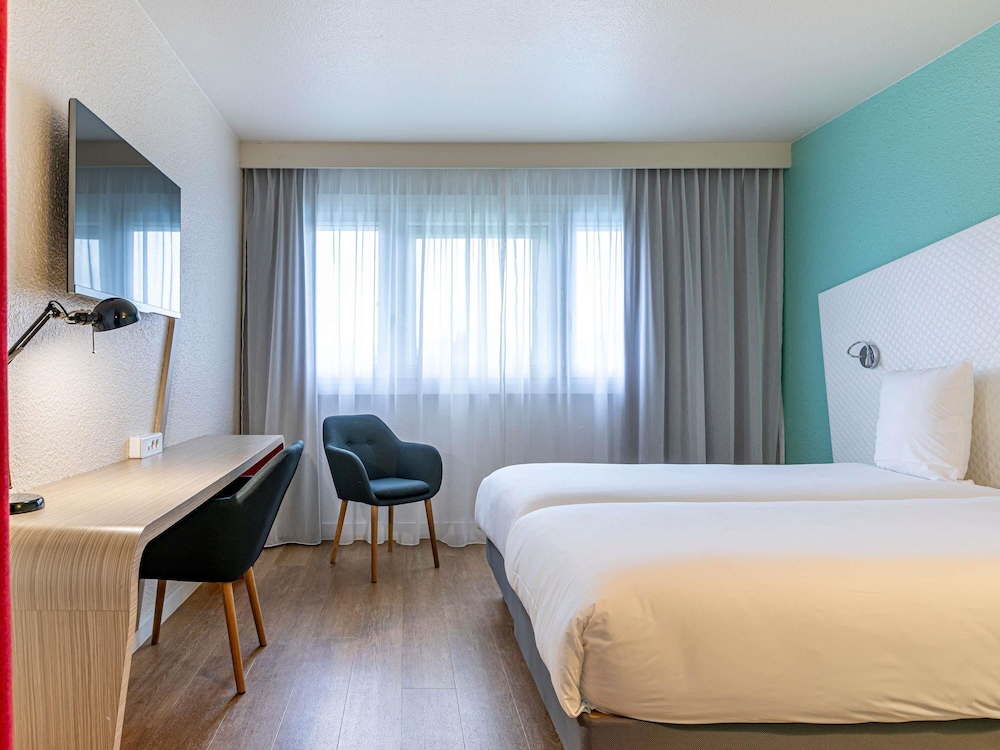 Habitación estándar con 2 camas individuales del hotel Mercure Paris Le Bourget