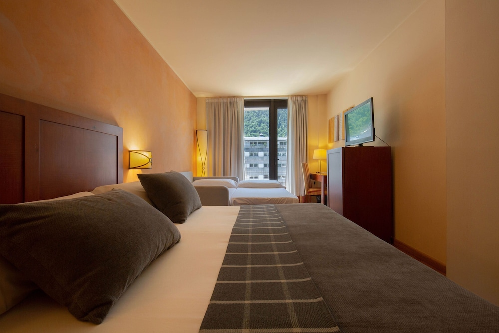 Habitación Cuádruple del hotel Magic Andorra. Foto 1