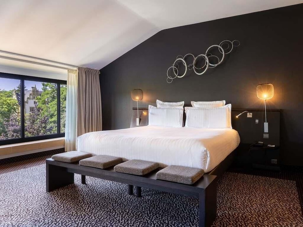 SUITE JUNIOR, 1 cama king size, 3er piso, vistas al Palacio del Gobernador del hotel La Citadelle Metz-mgallery. Foto 2