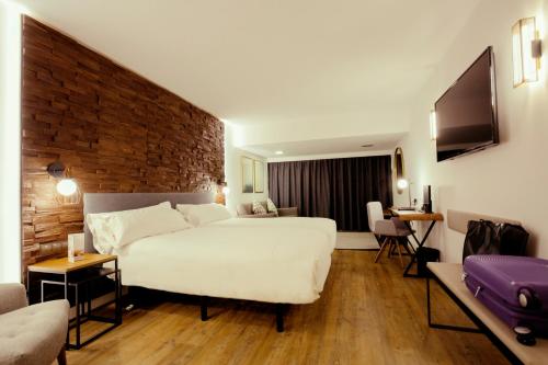 Habitación Doble Deluxe - 2 camas del hotel Yomo Centric. Foto 5