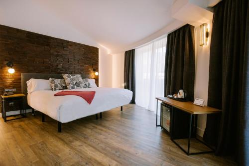 Habitación Doble Deluxe con balcón - 1 o 2 camas del hotel Yomo Centric. Foto 2