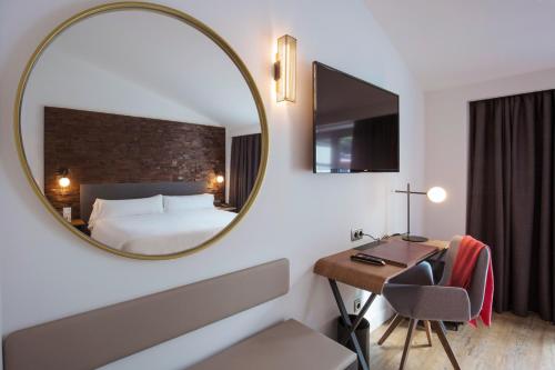 Habitación Deluxe del hotel Yomo Centric. Foto 4
