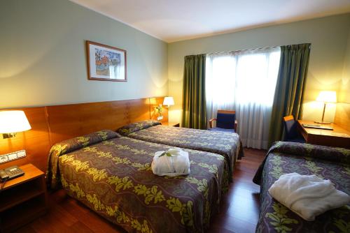 Habitación Triple del hotel Zenit Diplomatic. Foto 3