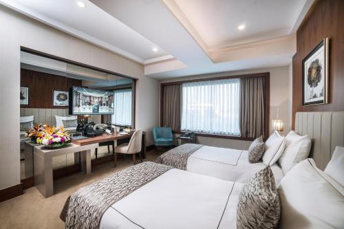 Habitación Superior con vistas al interior del hotel Vogue Hotel Supreme Istanbul. Foto 4