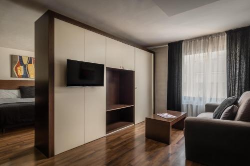 Junior suite 1 Cama king Sofá Cama incluido del hotel Alegria President. Foto 1