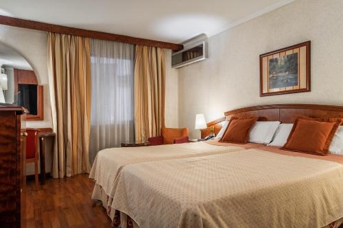 Habitación cuádruple del hotel Alegria President. Foto 6