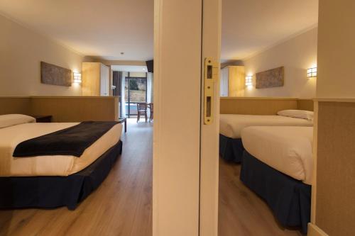 Habitación doble Comunicada 2 Camas dobles del hotel Yomo Patagonia