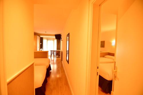 Habitación doble Comunicada 2 Camas dobles del hotel Yomo Patagonia. Foto 5