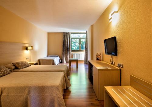 Habitación triple 3 camas individuales Normal del hotel Panorama and Spa. Foto 4