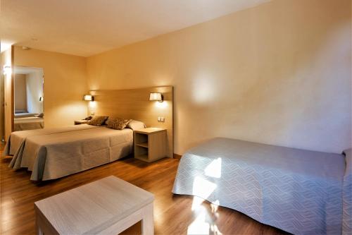 Habitación triple 3 camas individuales Normal del hotel Panorama and Spa. Foto 6