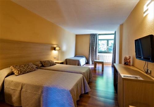 Habitación triple 3 camas individuales Normal del hotel Panorama and Spa. Foto 7