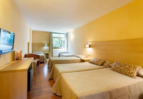 Habitación Quíntuple con acceso al spa del hotel Panorama and Spa. Foto 3