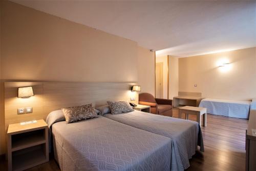 Habitación Cuádruple con acceso al spa del hotel Panorama and Spa. Foto 2