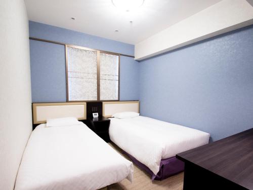 Habitación Estudio Doble para no fumadores - 2 camas del hotel Hearton Kitaumeda. Foto 2