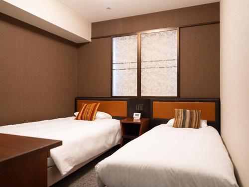 Estudio Doble - Fumadores - 2 camas del hotel Hearton Kitaumeda. Foto 1
