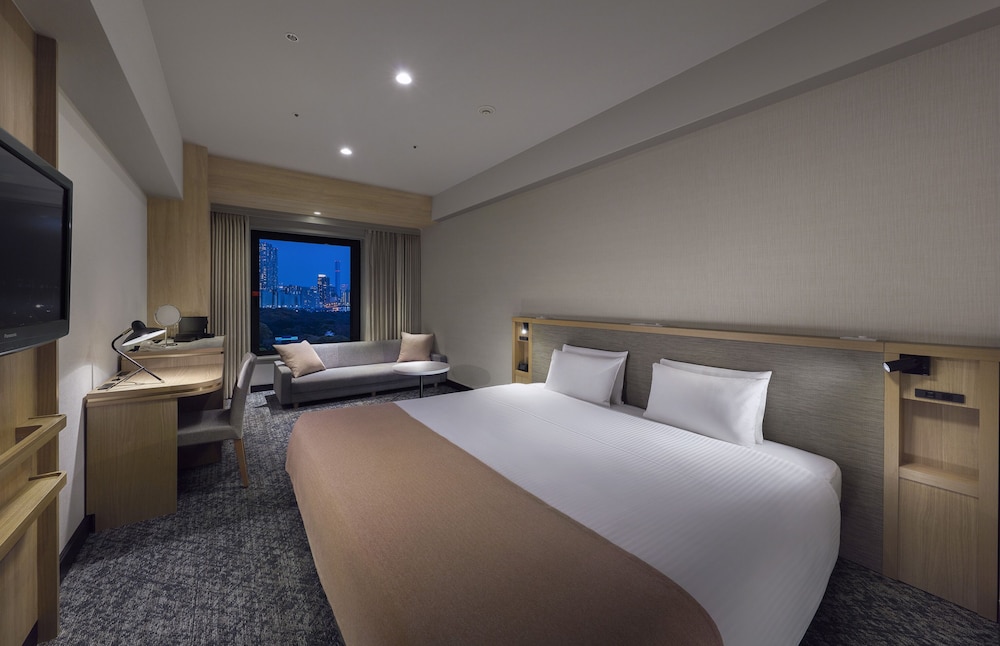 Habitación Deluxe, 1 cama de matrimonio grande con sofá cama (for 3 people / High Floor) del hotel Villa Fontaine Grand Tokyo-Shiodome. Foto 1