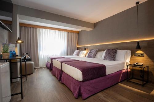 Habitación Triple del hotel Yomo Eureka