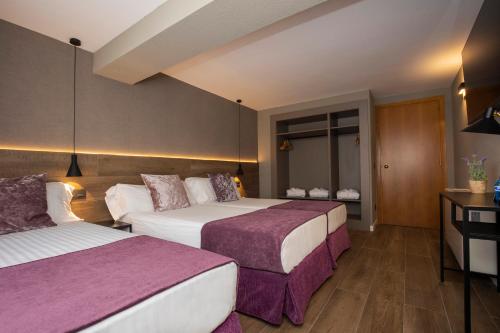 Habitación Triple del hotel Yomo Eureka. Foto 1