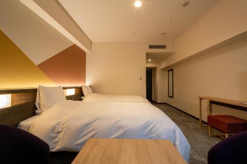 Habitación Doble para fumadores con cama supletoria - 2 camas del hotel Kanazawa. Foto 2