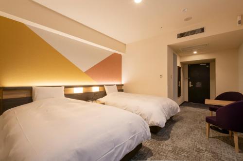 Habitación Doble Superior para no fumadores - 2 camas del hotel Kanazawa. Foto 2