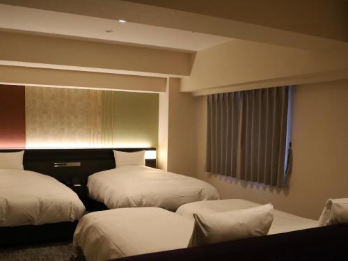 Suite Doble Executive - 2 camas - Para no fumadores del hotel Kanazawa. Foto 2