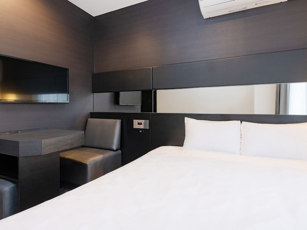Habitación Queen Estándar del hotel The OneFive Osaka Namba Dotonbori. Foto 1