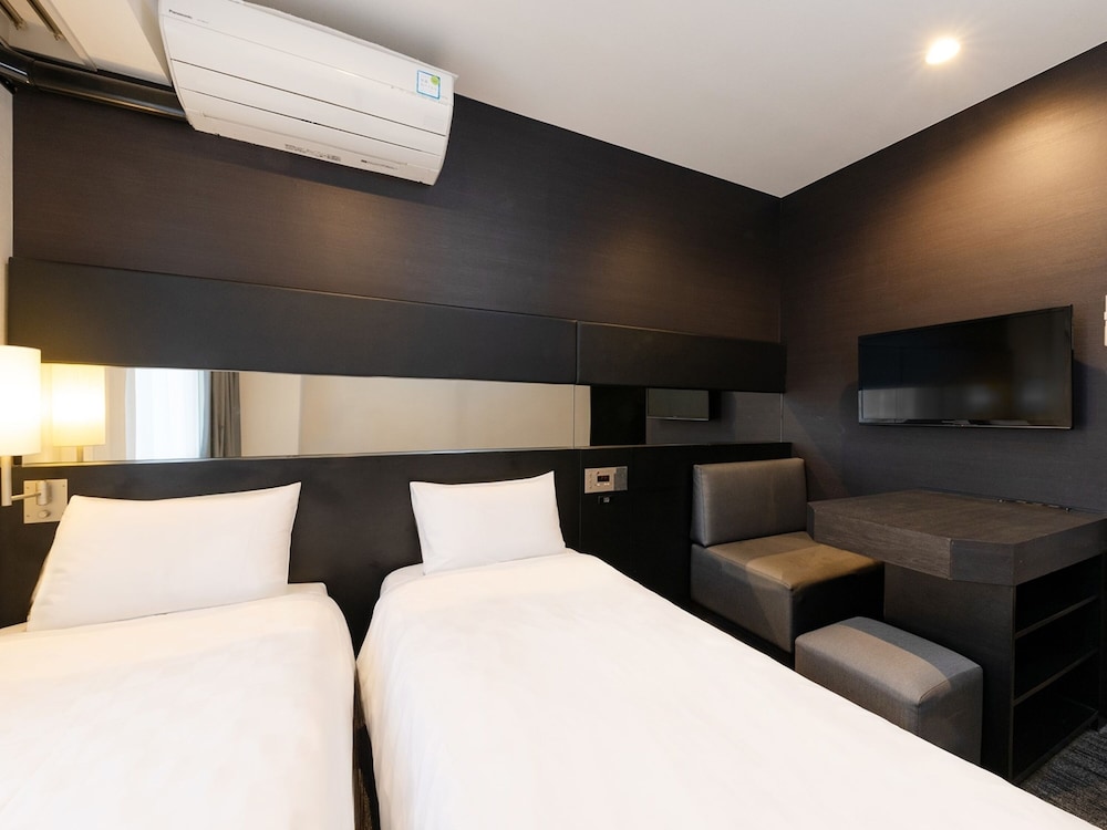 Habitación Twin Estándar del hotel The OneFive Osaka Namba Dotonbori. Foto 1