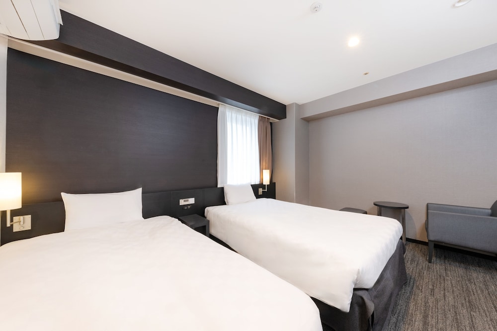 Habitación Twin Superior del hotel The OneFive Osaka Namba Dotonbori. Foto 1