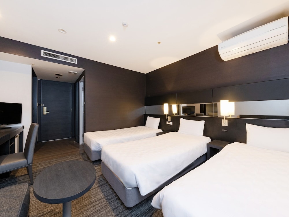 Habitación Triple Superior del hotel The OneFive Osaka Namba Dotonbori. Foto 1