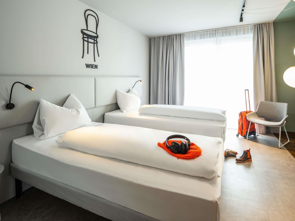 Habitación estándar con 2 camas individuales del hotel Ibis Styles Graz Messe. Foto 6