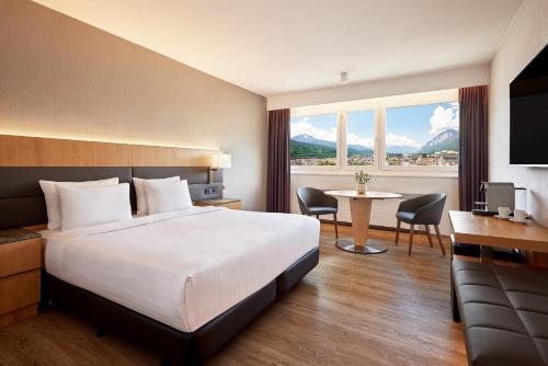 Habitación Deluxe con cama extragrande y vistas a la montaña - Planta alta del hotel Ac Hotel Innsbruck