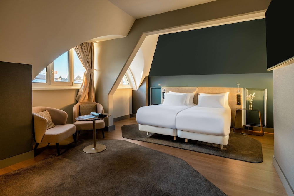Habitación familiar (2Adults + 2Children) del hotel NH Collection Salzburg City. Foto 1