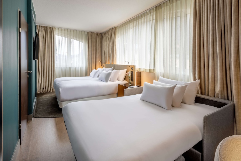 Habitación familiar (2Adults + 2Children) del hotel NH Collection Salzburg City. Foto 2
