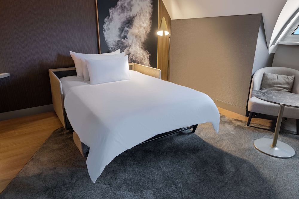 Habitación familiar (2Adults + 2Children) del hotel NH Collection Salzburg City. Foto 4