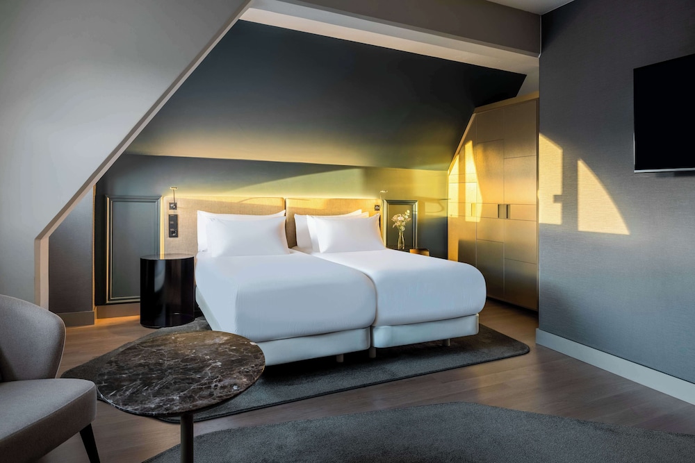 Habitación familiar (2Adults + 2Children) del hotel NH Collection Salzburg City. Foto 9