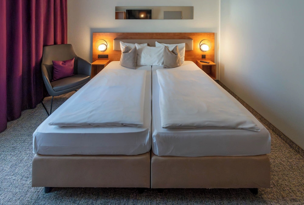 Habitación Standard con 2 camas individuales del hotel Mercure Salzburg City. Foto 3