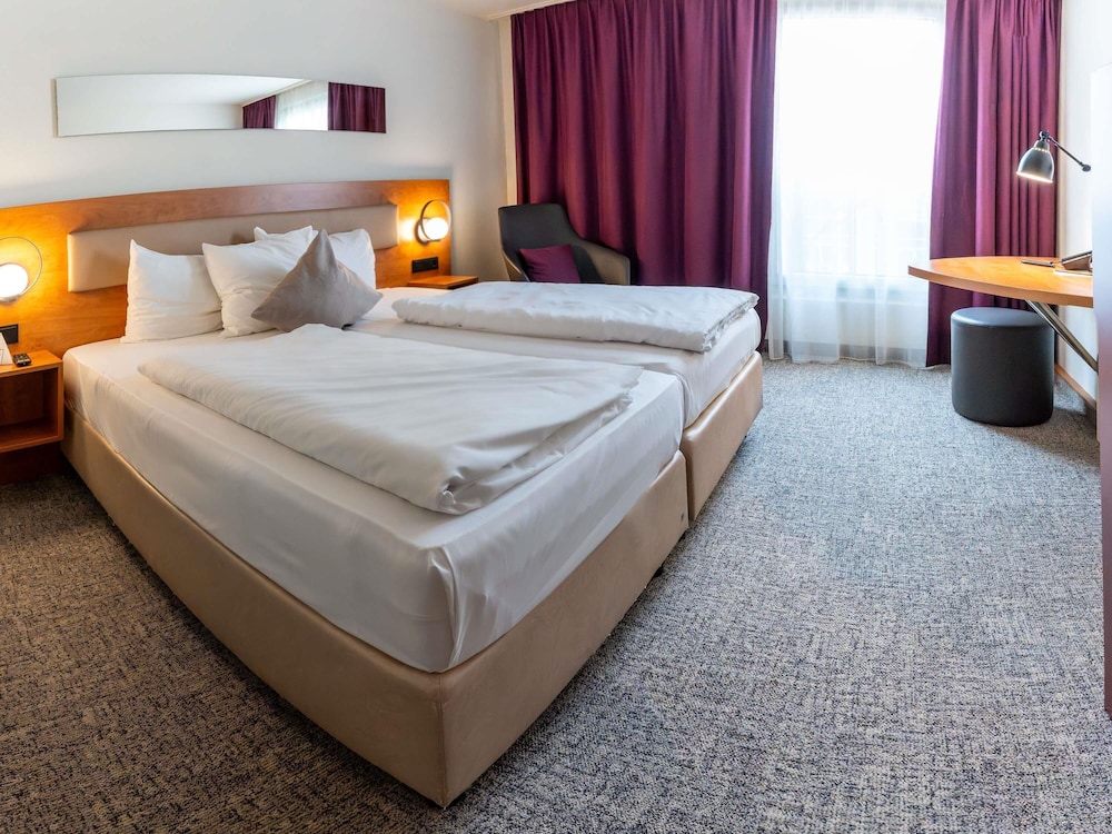 Habitación Standard con 2 camas individuales del hotel Mercure Salzburg City. Foto 8