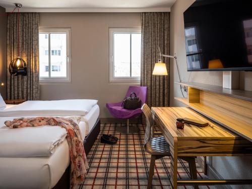 Habitación Doble Deluxe del hotel Mercure Salzburg City. Foto 8